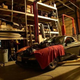 A Mazda RX-7 in an auto shop
